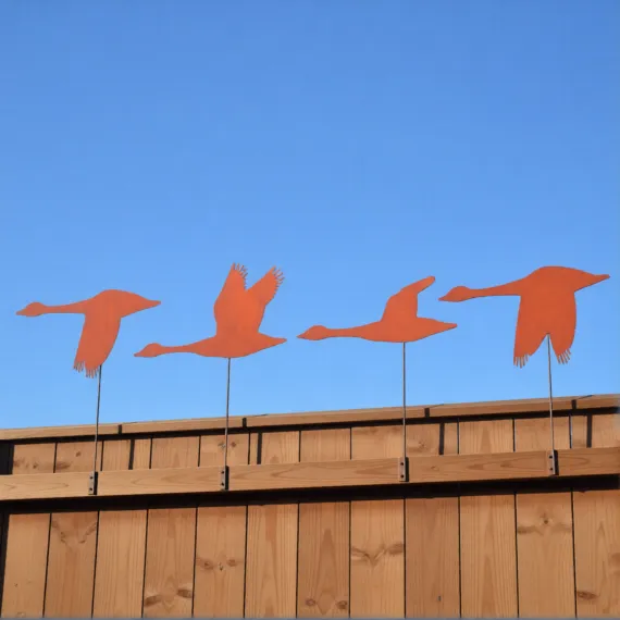 Rustic metal goose fence toppers – handcrafted garden decorations or quirky outdoor gifts for bird lovers