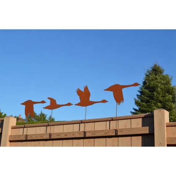 Rustic metal goose fence toppers – handcrafted garden decorations or quirky outdoor gifts for bird lovers