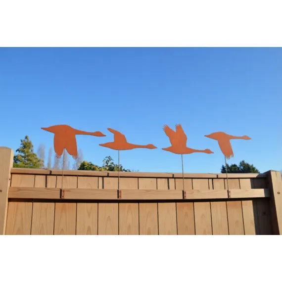 Rustic metal goose fence toppers – handcrafted garden decorations or quirky outdoor gifts for bird lovers